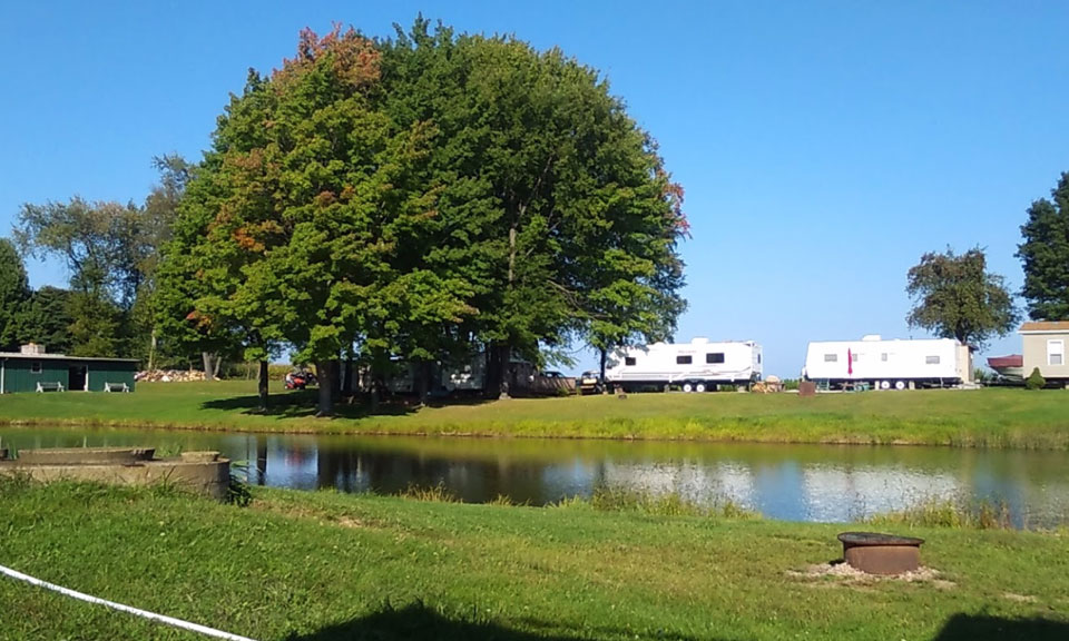 RV Campers by the Pond at Pine Lane Campground